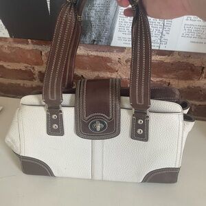 White and brown leather Coach purse